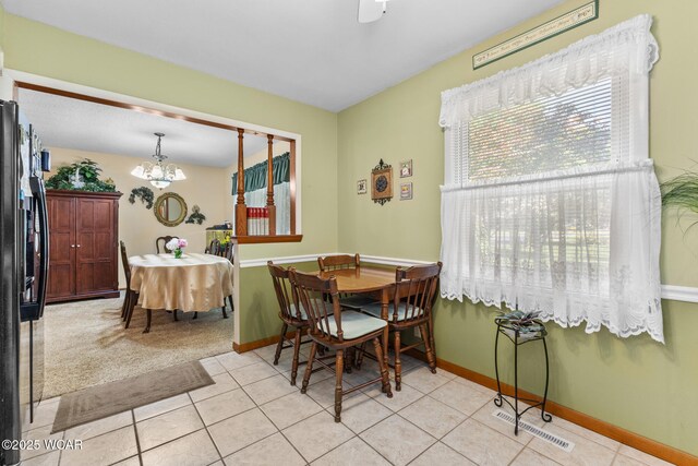 3540 Yoakam Rd, Lima, OH 45806 - dining space with a chandelier, baseboards, and light tile patterned floors