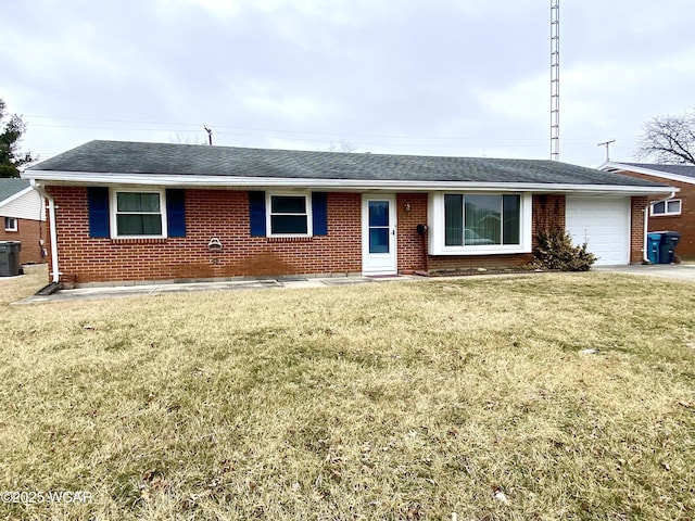 single story home featuring a garage and a front lawn