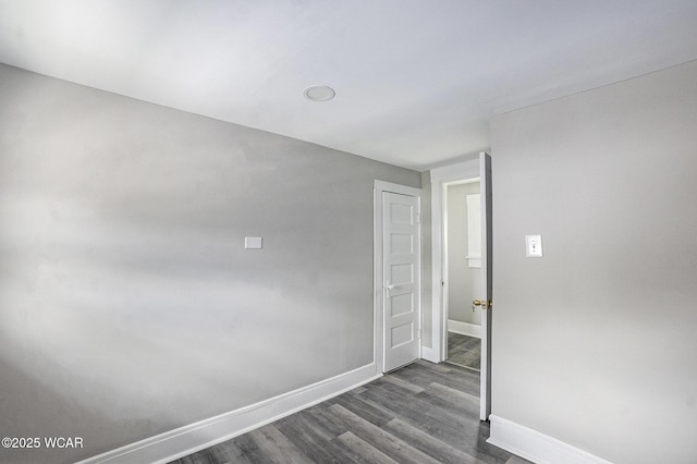 526 S Pine St, Lima, OH 45804 - unfurnished room featuring baseboards and dark wood finished floors