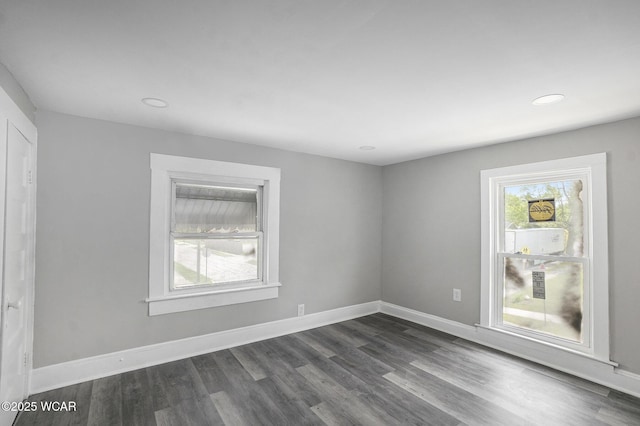 526 S Pine St, Lima, OH 45804 - spare room featuring dark wood finished floors, baseboards, and recessed lighting