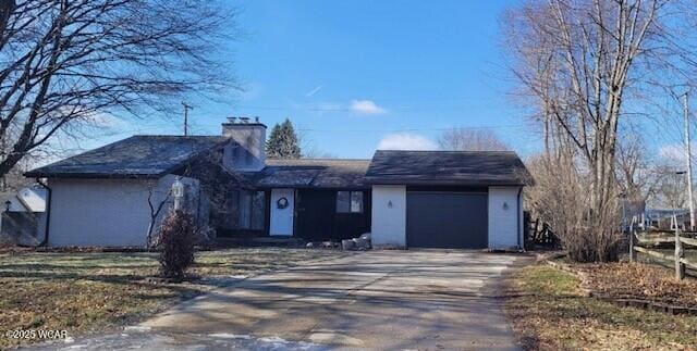 single story home with a garage