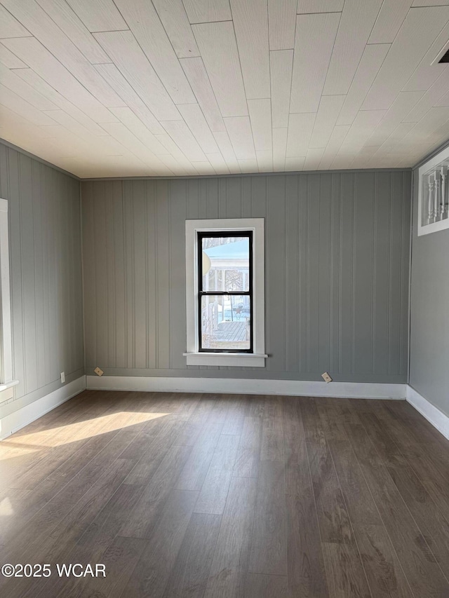 unfurnished room featuring hardwood / wood-style flooring