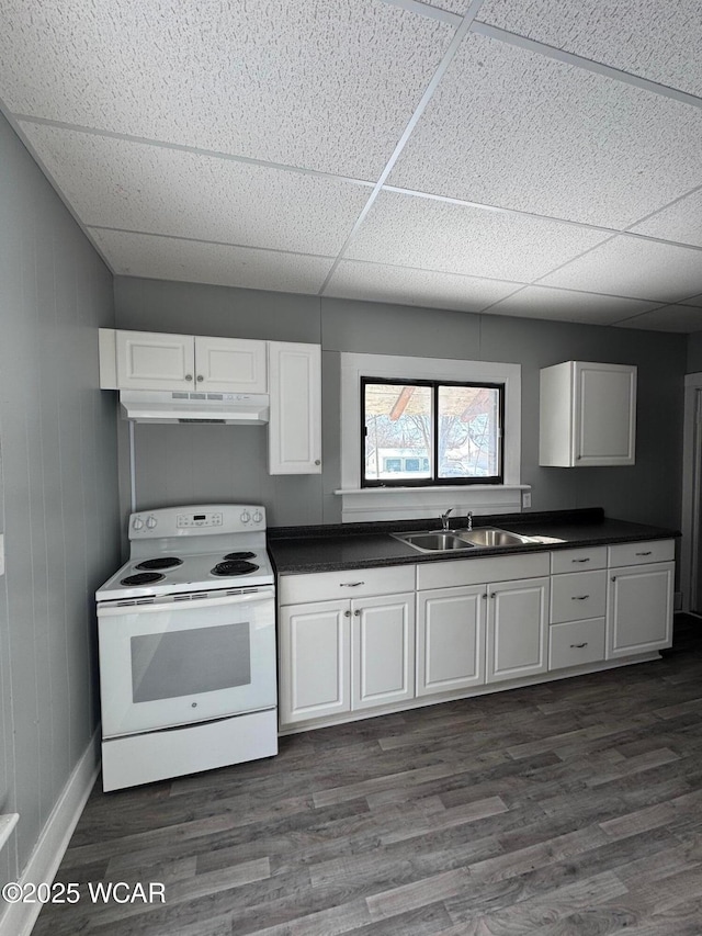 kitchen featuring sink, a drop ceiling, white cabinetry, dark hardwood / wood-style flooring, and white electric stove