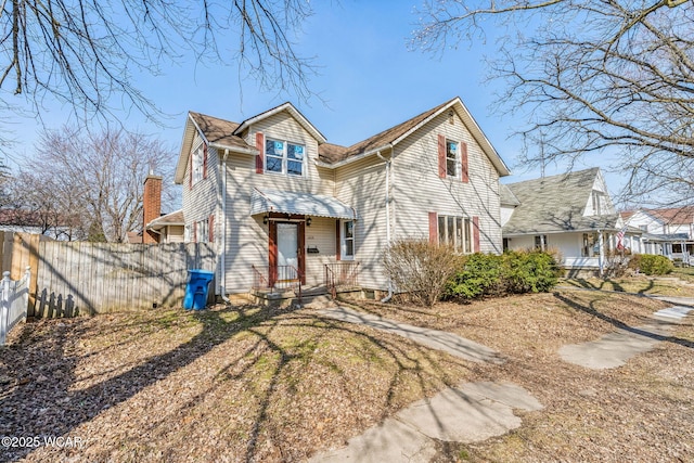 view of front of property with fence