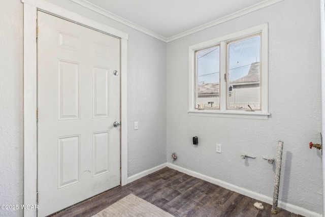 clothes washing area featuring dark wood-style floors, baseboards, hookup for an electric dryer, laundry area, and crown molding