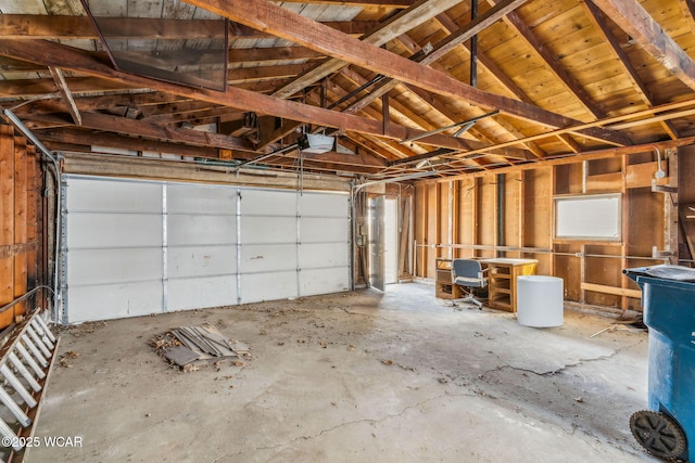 garage featuring a garage door opener