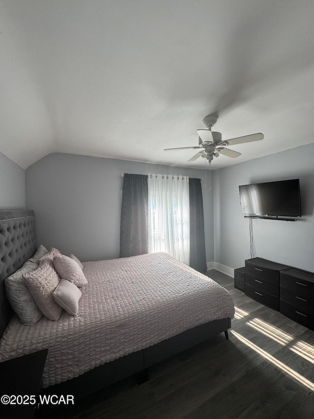 110 Heisel St, Kenton, OH 43326 - bedroom with a ceiling fan, lofted ceiling, and wood finished floors