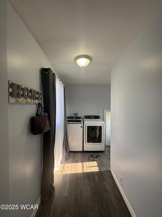 110 Heisel St, Kenton, OH 43326 - hallway featuring washing machine and clothes dryer and wood finished floors