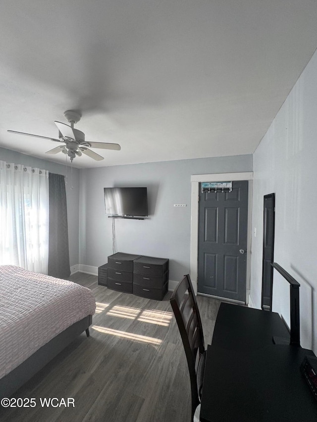 110 Heisel St, Kenton, OH 43326 - bedroom featuring ceiling fan and wood finished floors