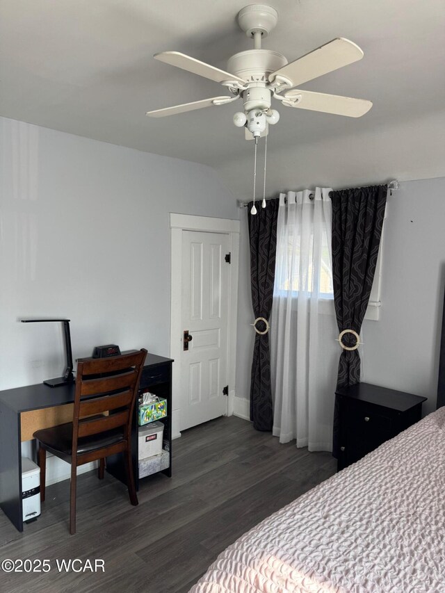 110 Heisel St, Kenton, OH 43326 - bedroom with wood finished floors, a ceiling fan, and an office area