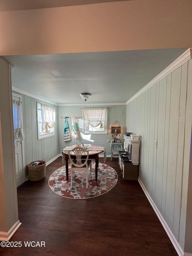 119 E N St, Kenton, OH 43326 - dining room featuring ornamental molding, wood finished floors, and healthy amount of natural light