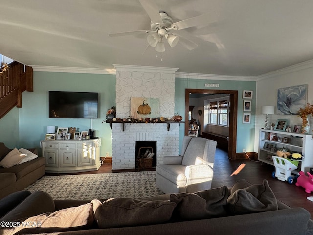 119 E N St, Kenton, OH 43326 - living area featuring crown molding, wood finished floors, ceiling fan, and a fireplace