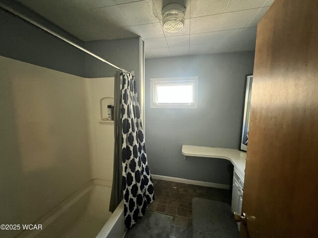 314 N Market St, Kenton, OH 43326 - full bath with shower / tub combo with curtain and tile patterned flooring