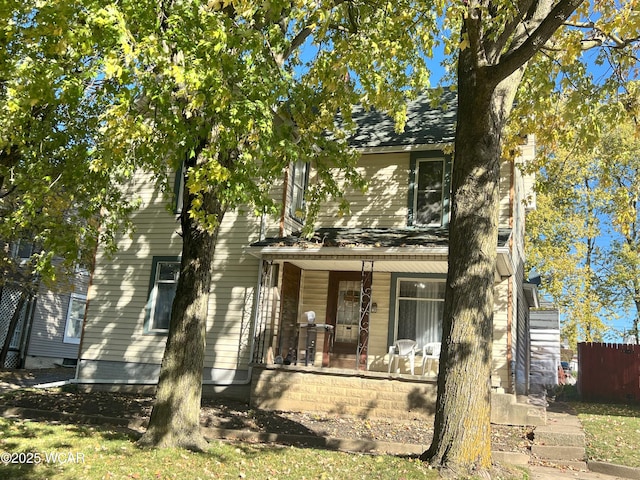 314 N Market St, Kenton, OH 43326 - view of property hidden behind natural elements with covered porch