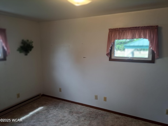 10510 Shenk Rd, Delphos, OH 45833 - carpeted spare room with a baseboard radiator and baseboards