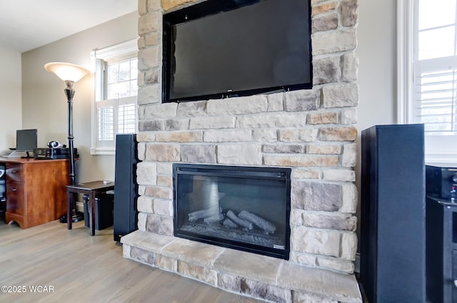 details with a fireplace and hardwood / wood-style floors