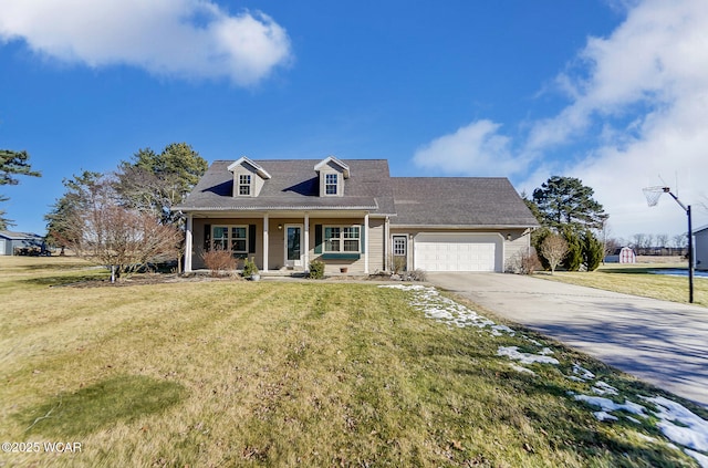 cape cod-style house with a garage, covered porch, and a front lawn