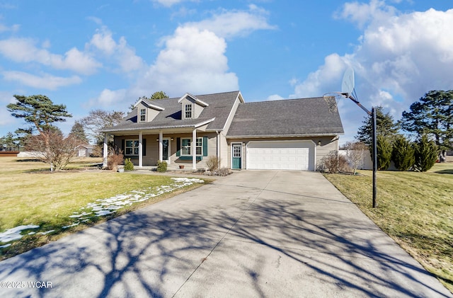 new england style home featuring a garage, a front lawn, and covered porch