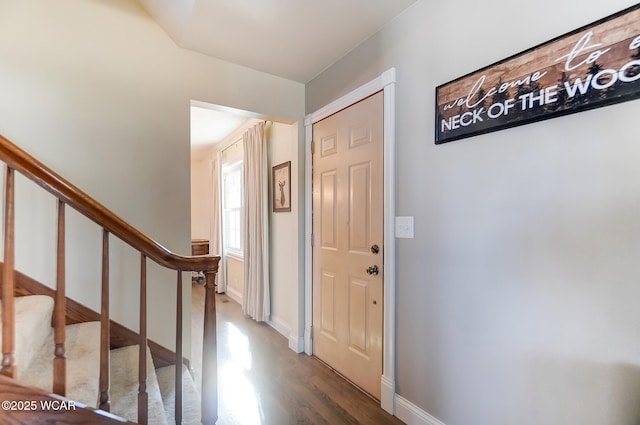 foyer entrance featuring hardwood / wood-style floors