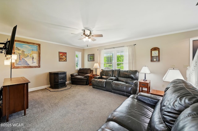 1106 S Grubb Rd, Lima, OH 45806 - carpeted living area with ornamental molding, a ceiling fan, and baseboards
