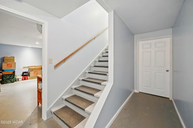 1106 S Grubb Rd, Lima, OH 45806 - staircase with finished concrete floors and baseboards