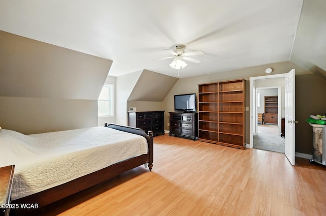 1106 S Grubb Rd, Lima, OH 45806 - bedroom with wood finished floors, lofted ceiling, and a ceiling fan