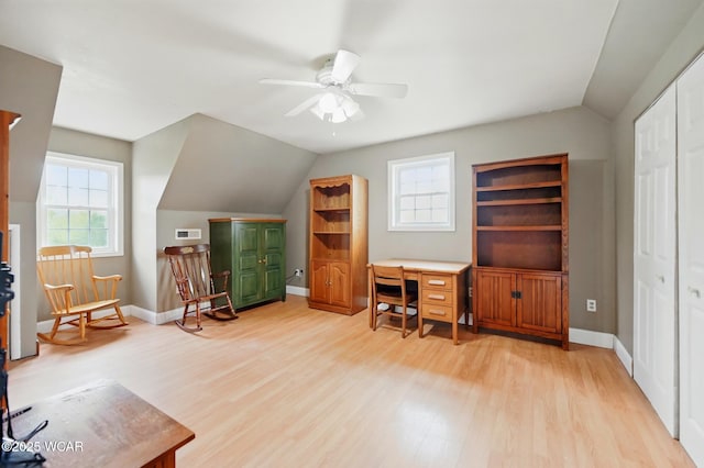 1106 S Grubb Rd, Lima, OH 45806 - home office with light wood-style flooring, lofted ceiling, a ceiling fan, and baseboards