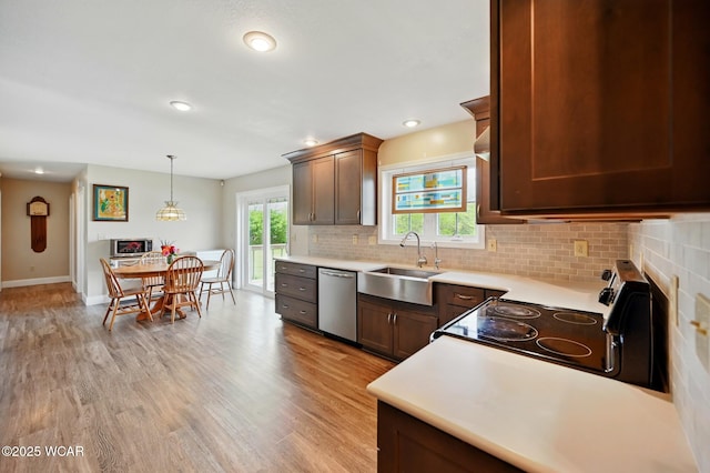 1106 S Grubb Rd, Lima, OH 45806 - kitchen featuring a sink, stainless steel dishwasher, light wood-style floors, electric stove, and recessed lighting