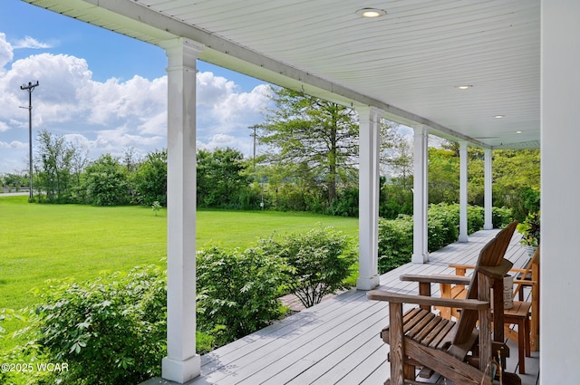 1106 S Grubb Rd, Lima, OH 45806 - wooden deck featuring a lawn and covered porch