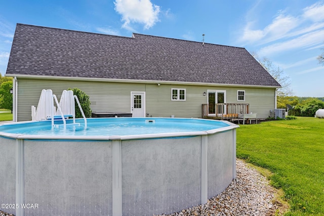1106 S Grubb Rd, Lima, OH 45806 - swimming pool featuring a yard, a deck, and cooling unit