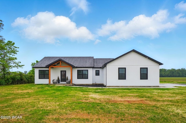 1771 Baty Rd, Lima, OH 45807 - modern farmhouse with roof with shingles and a front lawn