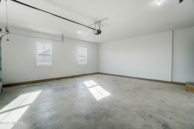 1771 Baty Rd, Lima, OH 45807 - garage with a garage door opener and baseboards
