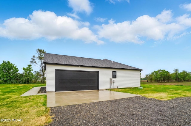 1771 Baty Rd, Lima, OH 45807 - view of side of home featuring a yard and a detached garage