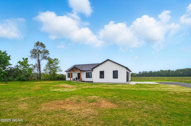 1771 Baty Rd, Lima, OH 45807 - view of front facade featuring a front yard and driveway