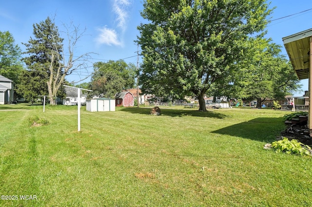 623 N Cherry St, Van Wert, OH 45891 - view of green lawn featuring a storage shed