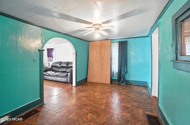 623 N Cherry St, Van Wert, OH 45891 - unfurnished room with arched walkways and a ceiling fan