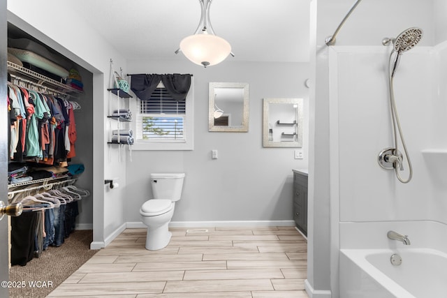 2435 Bible Rd, Lima, OH 45801 - full bath with shower / bath combination, vanity, wood finish floors, and a walk in closet