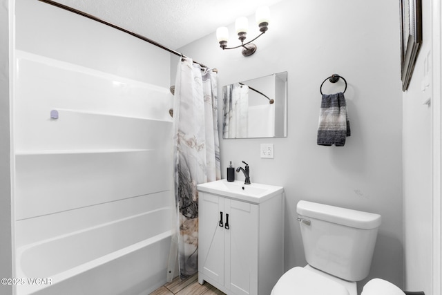 2435 Bible Rd, Lima, OH 45801 - full bath with shower / bathtub combination with curtain, vanity, and a textured ceiling