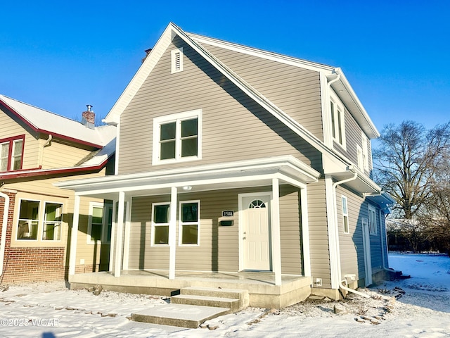 view of front of property featuring covered porch