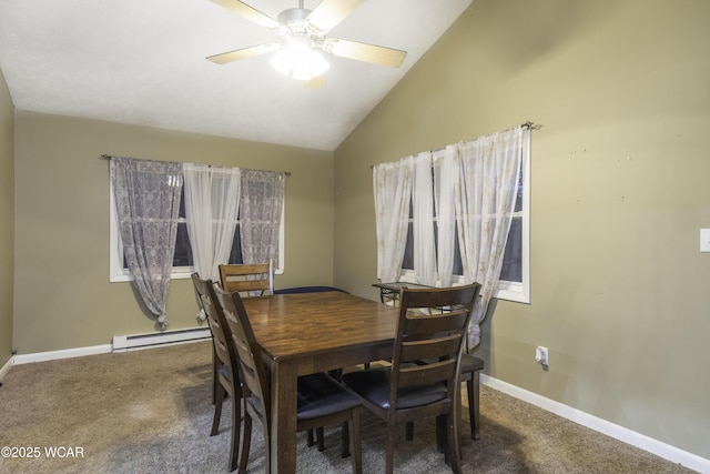 dining area featuring a baseboard heating unit, a ceiling fan, baseboards, vaulted ceiling, and carpet