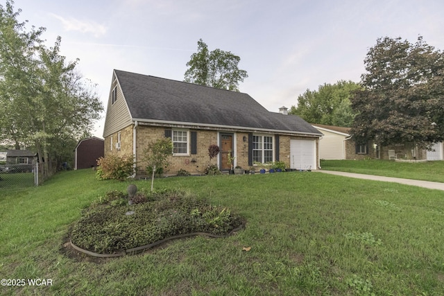 view of front facade featuring brick siding, an attached garage, a front yard, fence, and driveway