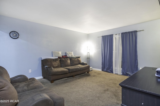 living area with carpet flooring and baseboards