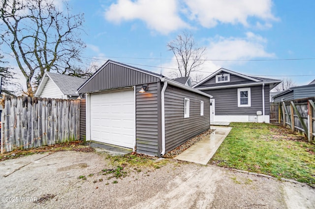 garage featuring a yard