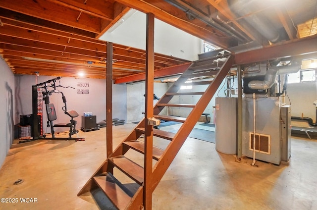 below grade area featuring gas water heater and stairs
