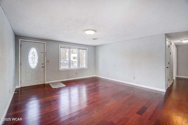 foyer featuring dark hardwood / wood-style floors