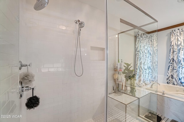 bathroom with shower with separate bathtub and crown molding