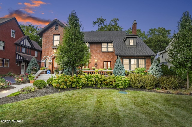 view of front of house with a lawn