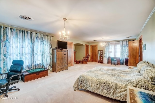 carpeted bedroom with a notable chandelier and ornamental molding