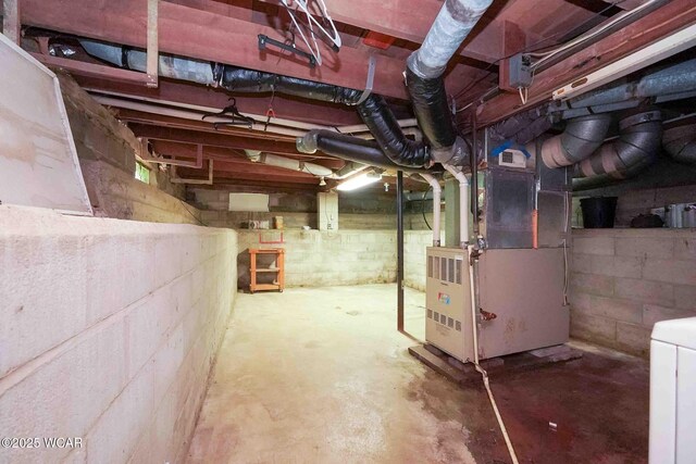 503 N Main St, Bluffton, OH 45817 - unfinished below grade area featuring washer / clothes dryer and heating unit