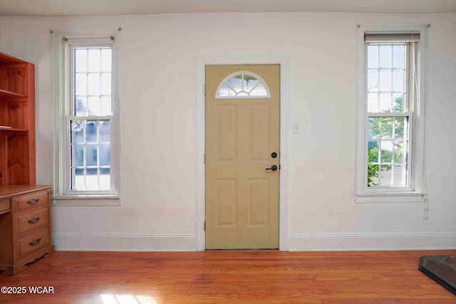 503 N Main St, Bluffton, OH 45817 - foyer entrance with light wood-style floors and healthy amount of natural light